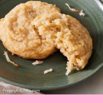 Pinterest graphic of a green plate with a coconut cookie with a half eaten one on it.