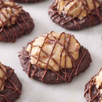 German chocolate cookies on a marble surface.