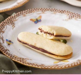 Pinterest graphic of a plate with a Milano cookie and a second half eaten one propped on top.