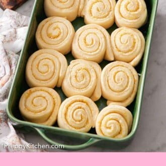 Pinterest graphic of a green baking dish with orange rolls.