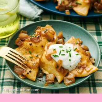 Pinterest graphic of a plate with pierogies, sour cream, and chives with a fork.