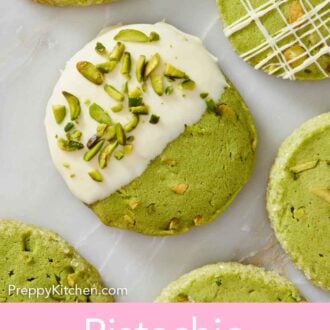 Pinterest graphic of a pistachio matcha cookie half dipped in white chocolate and topped with pistachios and more cookies on the side.