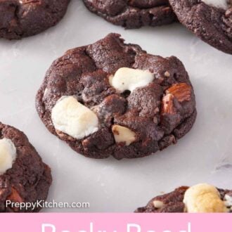 Pinterest graphic of rocky road cookies on a marble surface.