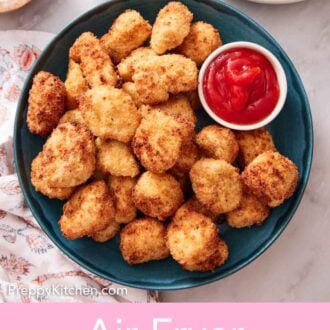 Pinterest graphic of a plate of air fryer chicken nuggets with a small bowl of ketchup.