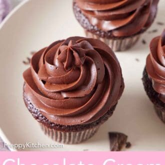 Pinterest graphic of chocolate cream cheese frosting piped over chocolate cupcakes on a plate.