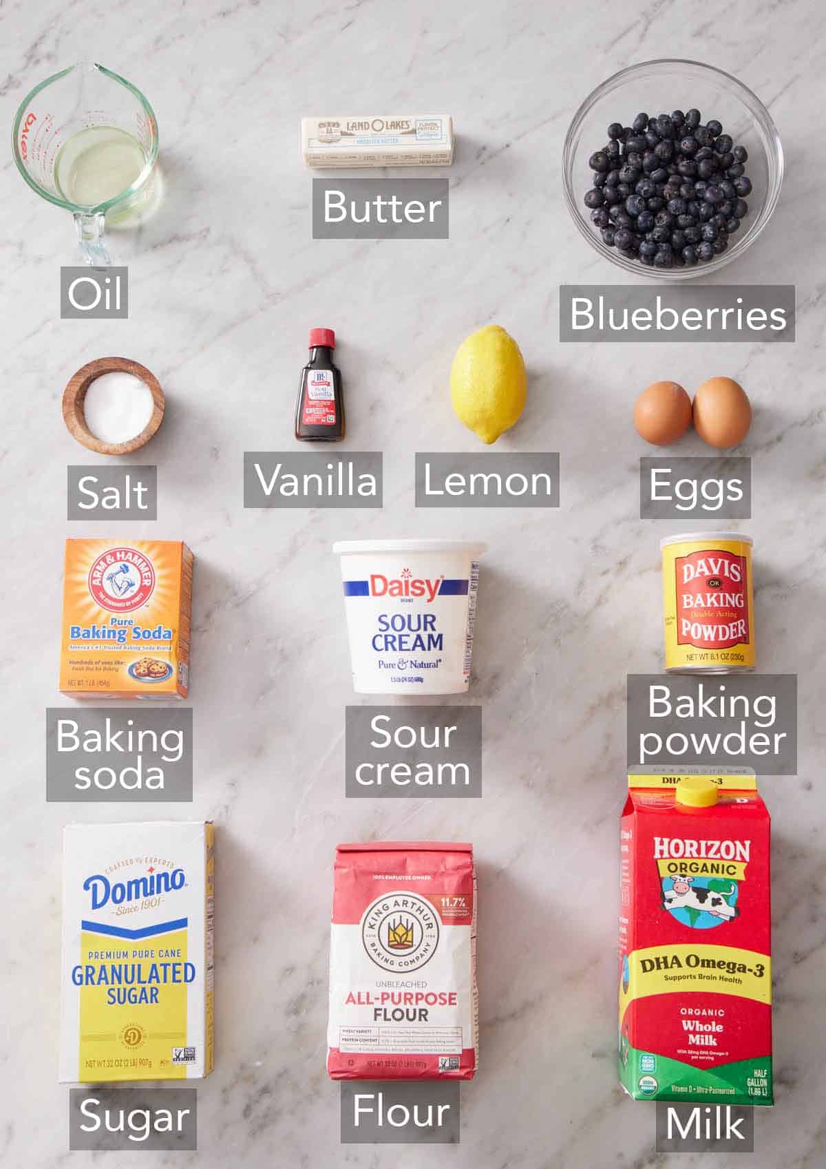 Ingredients needed to make lemon blueberry muffins.