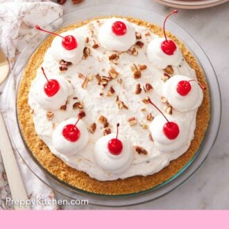 Pinterest graphic of an overhead view of a Millionaire Pie with dollops of whipped cream topped with maraschino cherries.