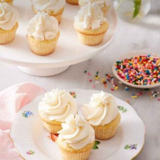 Pinterest graphic of a plate with three mini cupcakes with a cake stand in the back with more cupcakes.