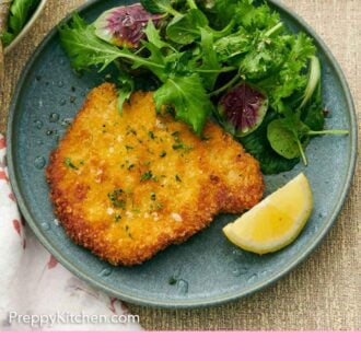 Pinterest graphic of a plate with a schnitzel, mixed greens, and a lemon wedge.