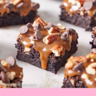 Pinterest graphic of cut pieces of turtle brownies on a marble surface.