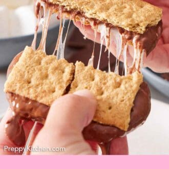 Pinterest graphic of an air fryer s'mores broken in half.