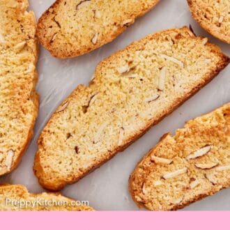 Pinterest graphic of multiple biscotti on a marble surface.