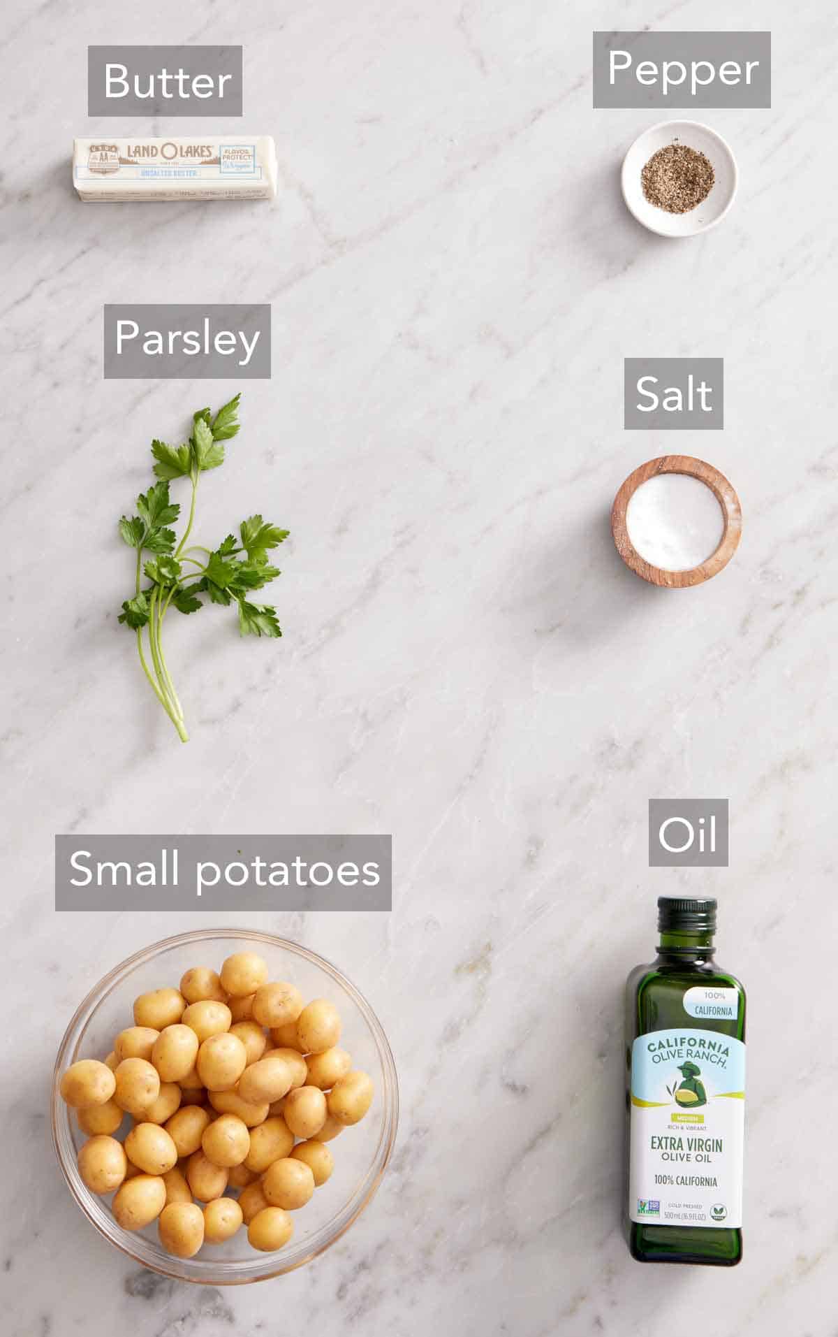 Ingredients needed to make boiled potatoes.