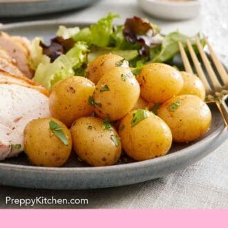 Pinterest graphic of a close up view of boiled potatoes garnished with parsley on a plate with some mixed greens and chicken.