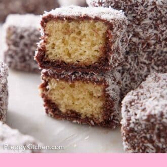 Pinterest graphic of a cut lamington, stacked on top of each other, with the interior facing out. More pieces surrounding them.