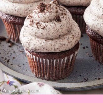 Pinterest graphic of a platter of multiple cupcakes topped with Oreo frosting.