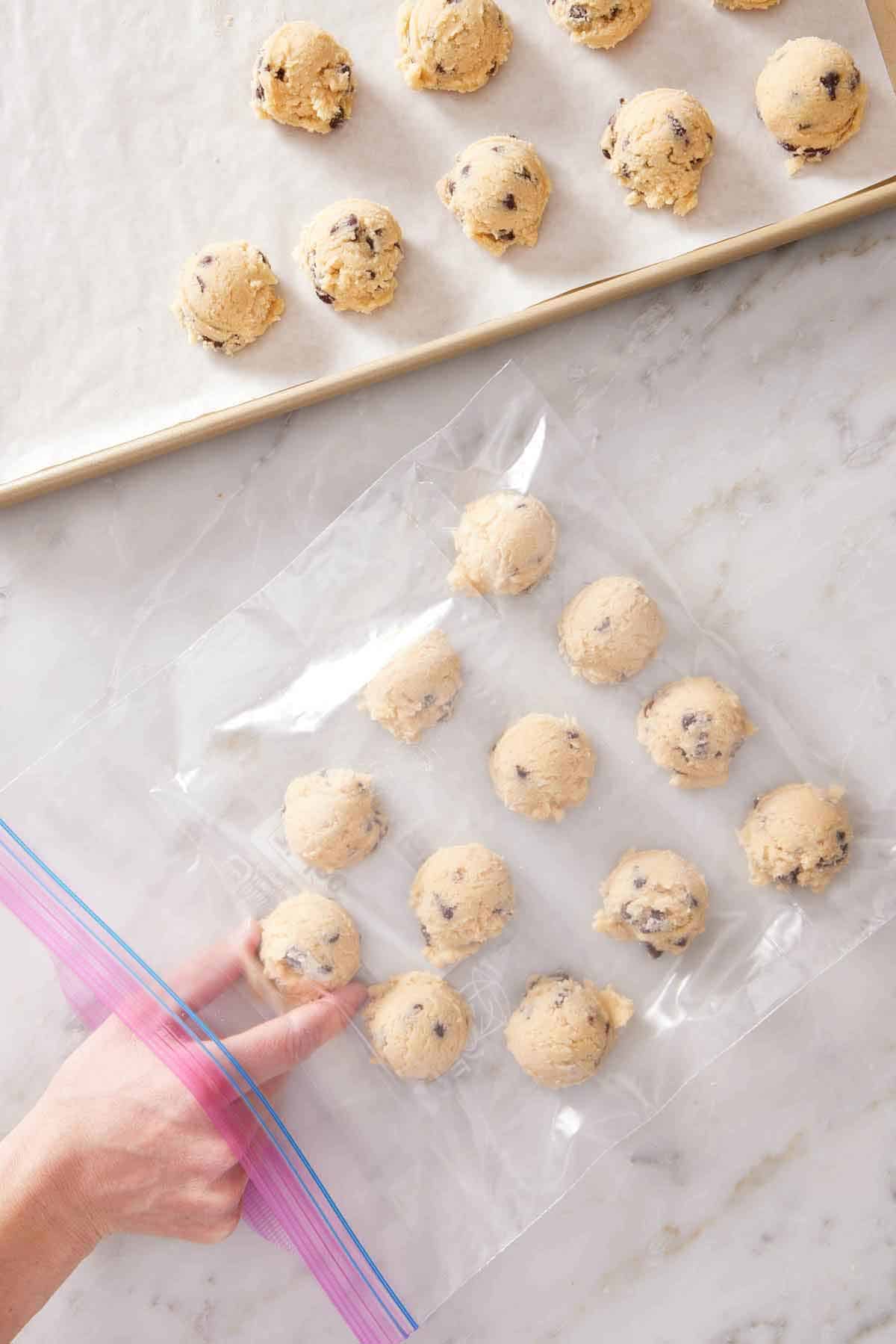 Frozen dough balls placed into a ziptop bag.