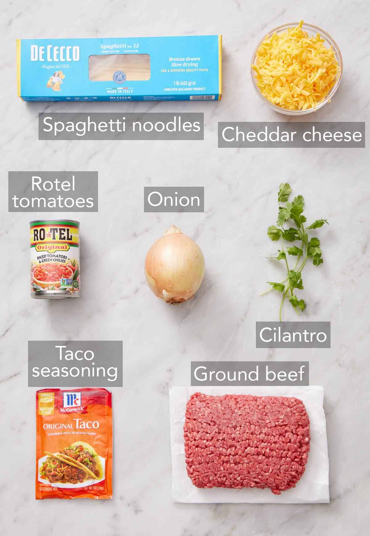 Ingredients needed to make taco spaghetti.