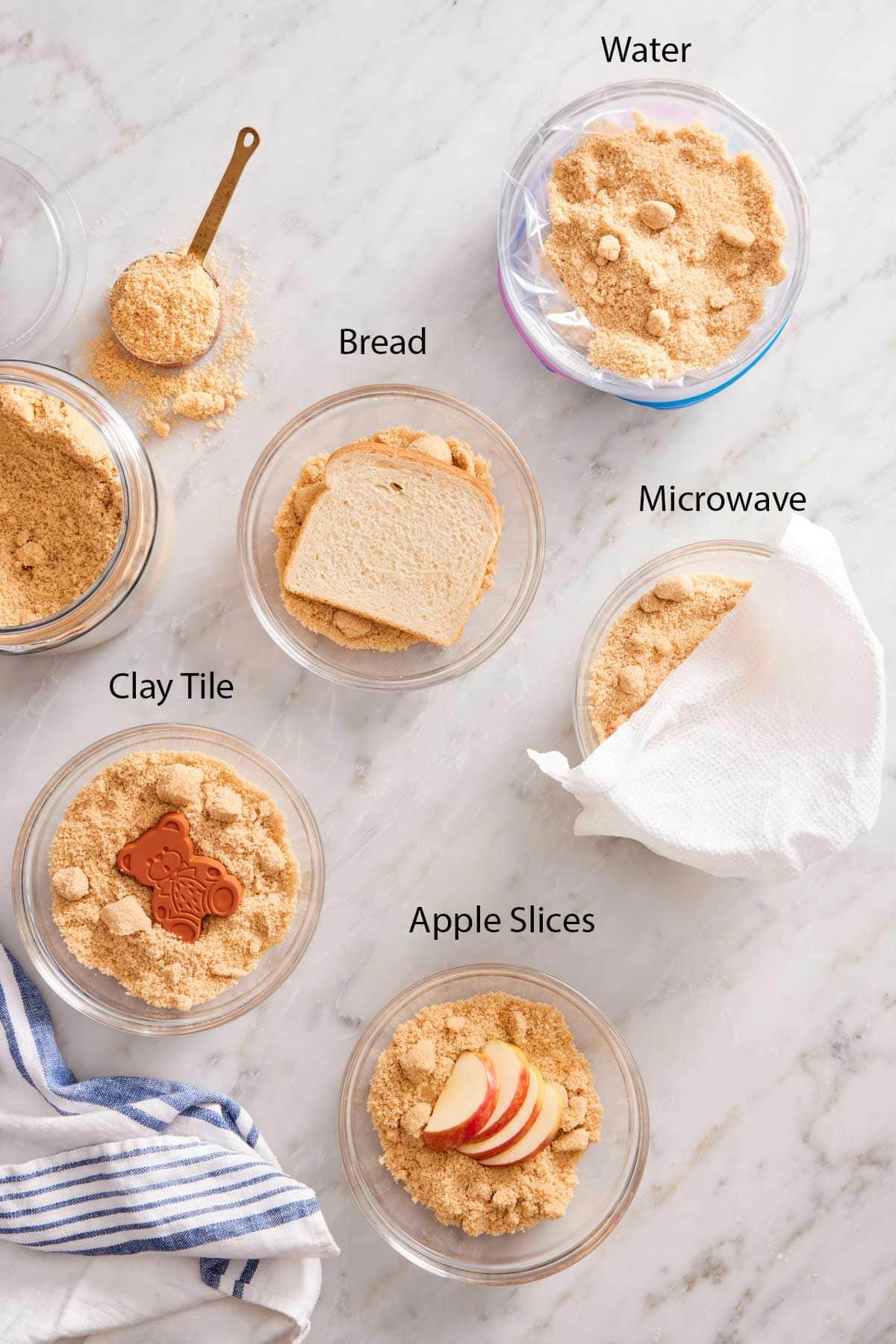 Five bowls of brown sugar showing how to soften brown sugar with five different methods.