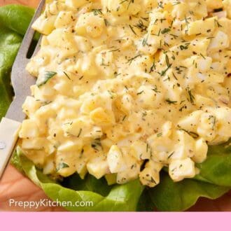 Pinterest graphic showing a close-up of egg salad topped with fresh dill.