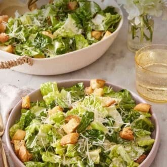 Pinterest graphic showing a plate with Caesar salad with a drink on the side.