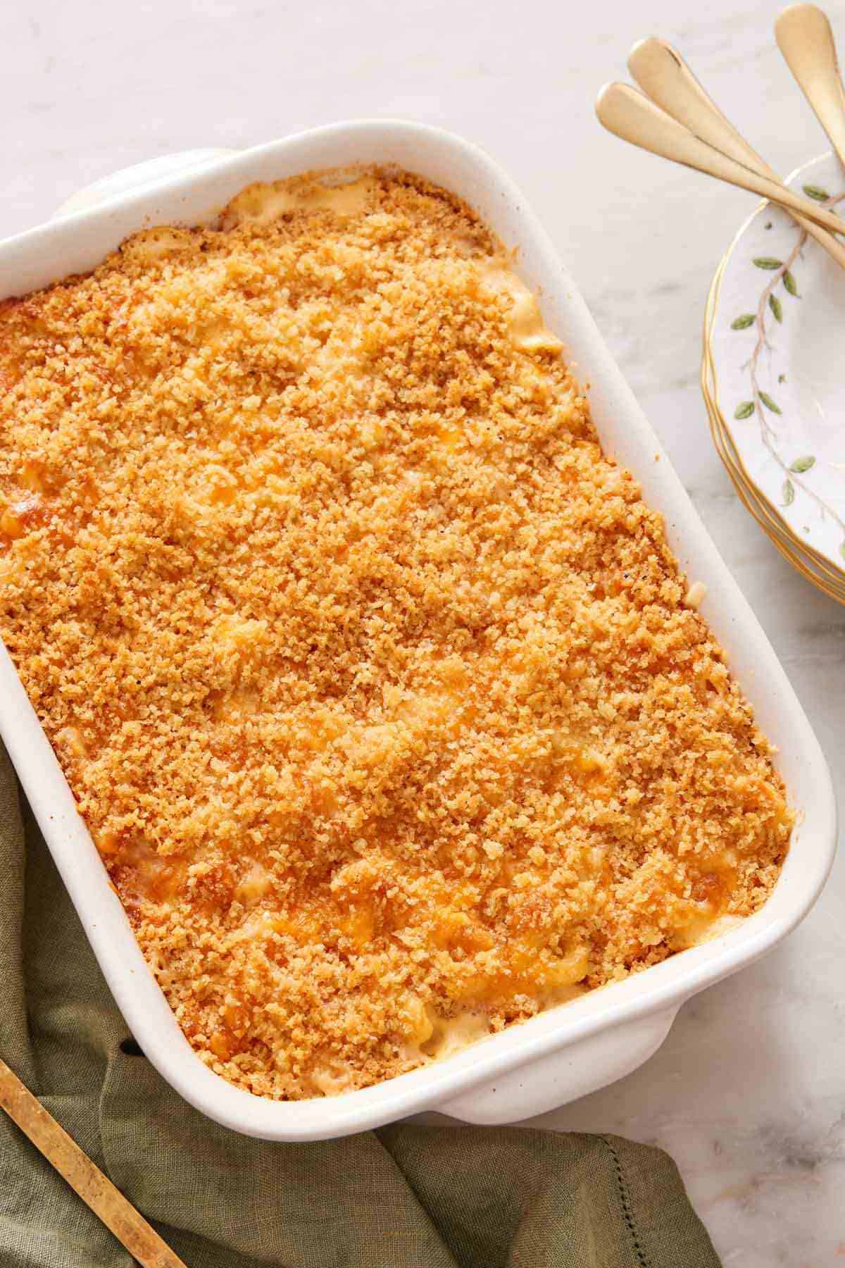 Mac and cheese in a white casserole dish.