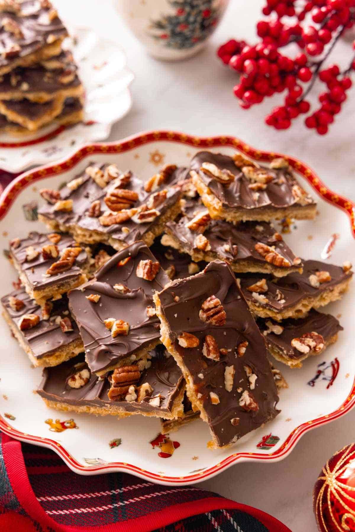 A pile of Christmas crack on a festive plate.