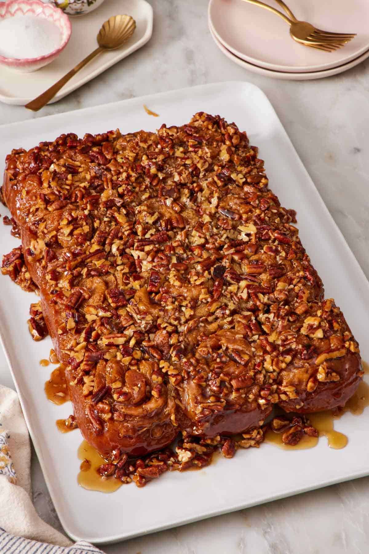 Pecan sticky buns on a large serving platter.