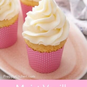 Pinterest graphic of a platter of moist vanilla cupcakes.