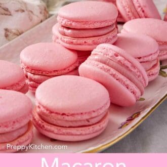 Pinterest graphic showing several pink macarons on a platter.