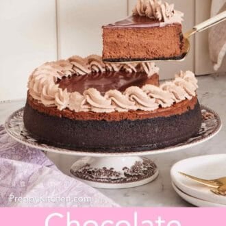 Pinterest graphic showing chocolate cheesecake on a patterned cake stand with a slice lifted up out of it.