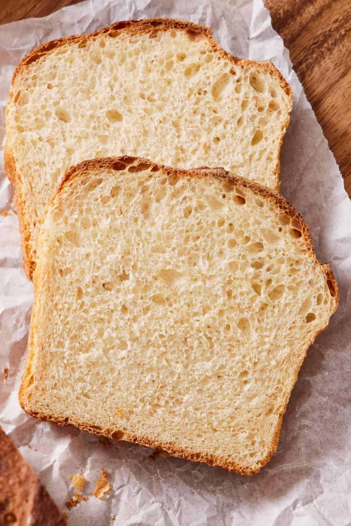 Two slices of bread, one overlapping the other.