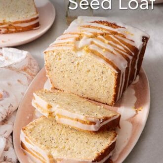 Pinterest graphic showing lemon poppy seed loaf on a platter with slices cut out.