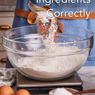 Pinterest graphic showing flour spooned into a bowl containing more flour on a kitchen scale. More baking ingredients in the foreground.