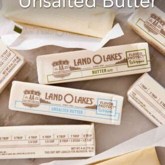 Pinterest graphic showing Overhead shot of sticks of butter, two unwrapped.