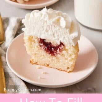 Pinterest graphic showing a close-up of a halved cupcake on a plate showing the filling. A glass of milk and the other half of the cupcake just behind.