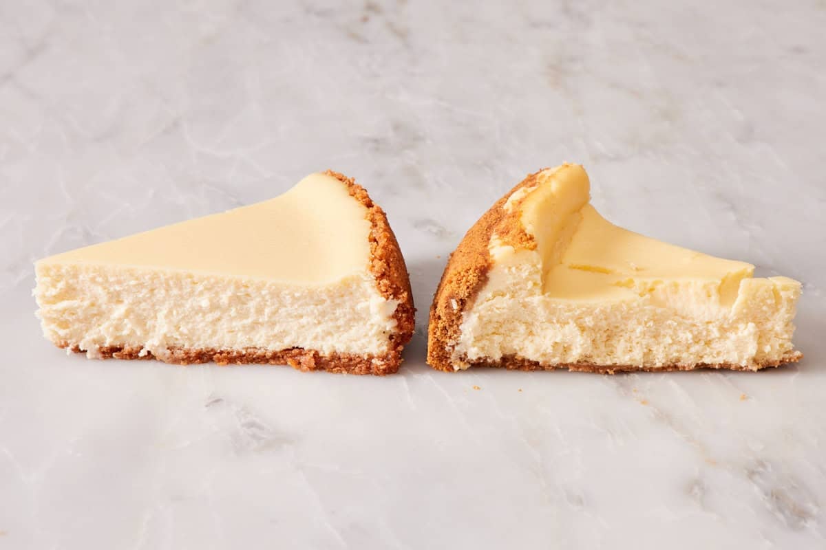 Two slices of cheesecake showing a slice comparison.
