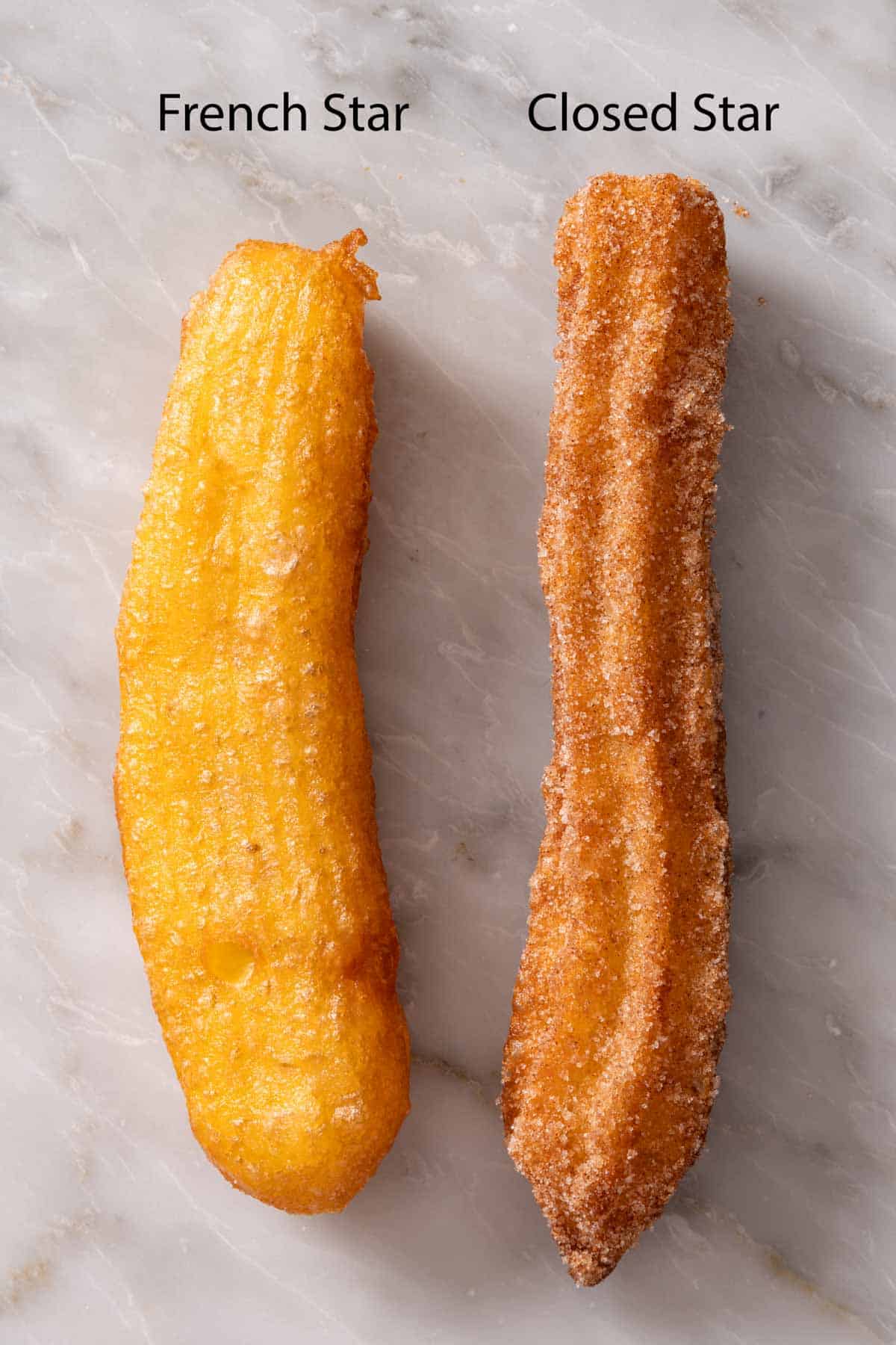 Two fried churros, one made with a French star and the other with a closed star.