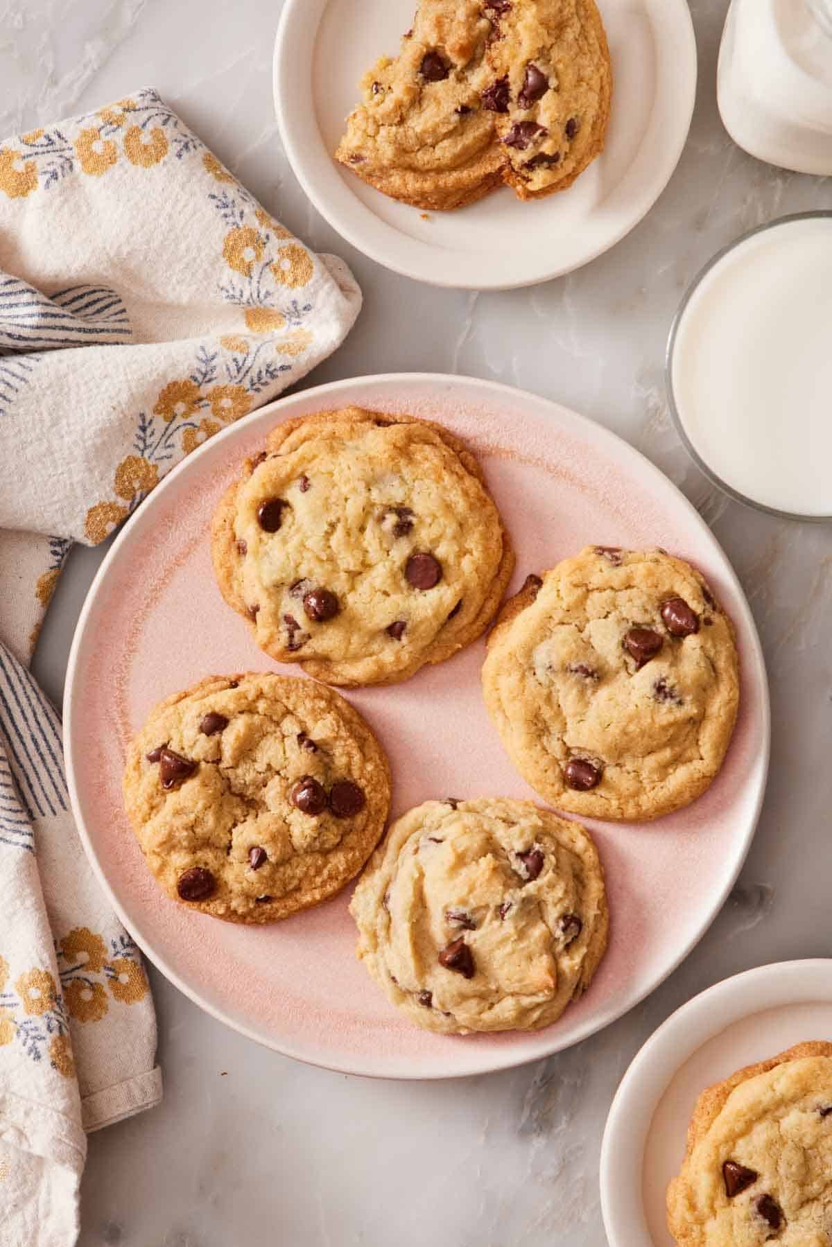 Overhead shot of chocolate chip cookies on plates.