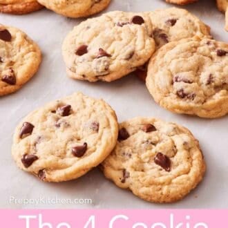 Pinterest graphic showing lots of chocolate chip cookies on a marble countertop.