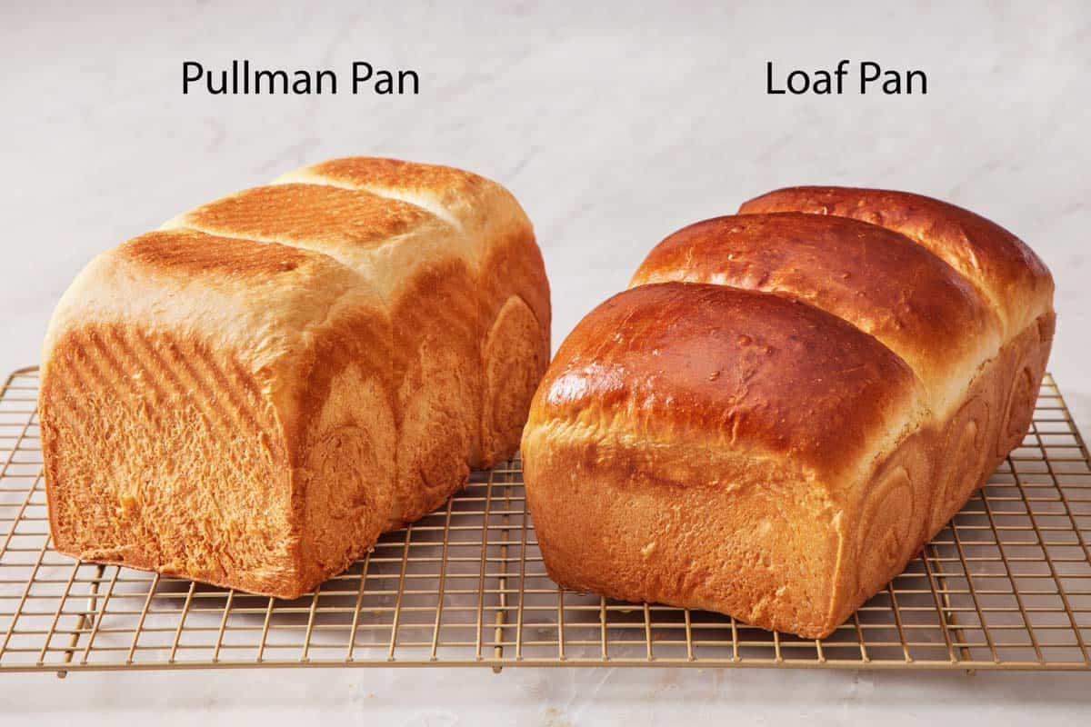 Two loaves of milk bread side by side, one baked in a Pullman pan, the other in a loaf pan.