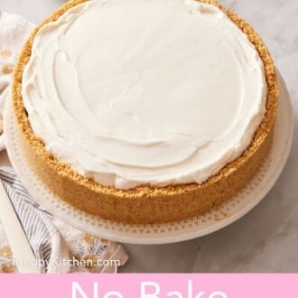 Pinterest graphic showing a whole no bake cheesecake on a stand.