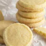 A group of butter cookies on parchment paper